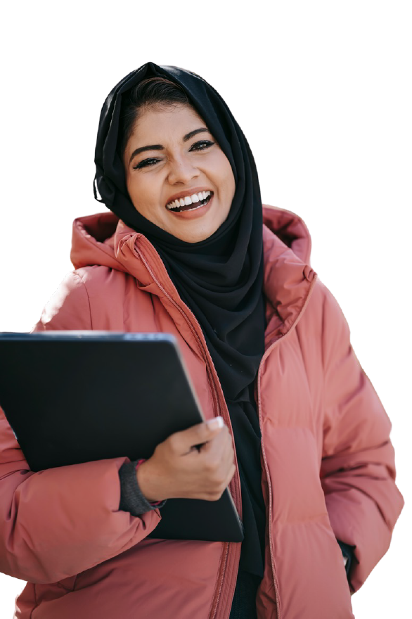 About Lingua Learn AustraliaSmiling student in a pink winter coat holding a laptop, representing online language courses with Lingua Learn Australia